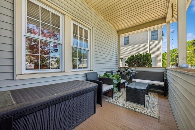 2660 Rosebud Ave, Merrick, NY 11566 - porch with an outdoor living space