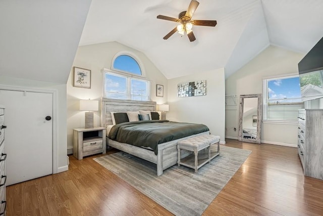 2660 Rosebud Ave, Merrick, NY 11566 - bedroom with vaulted ceiling, wood finished floors, ceiling fan, and baseboards