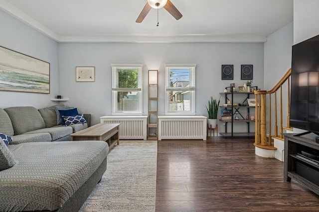 2660 Rosebud Ave, Merrick, NY 11566 - living room with radiator, ceiling fan, and wood finished floors