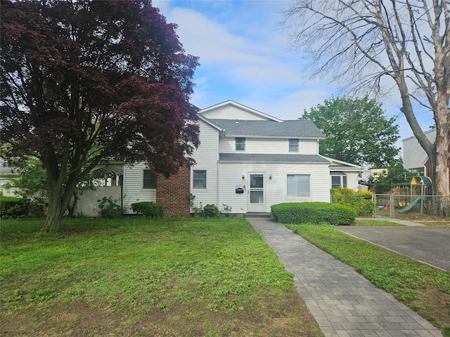 180 Donahue Ave, Inwood, NY 11096 - view of front of house with a playground