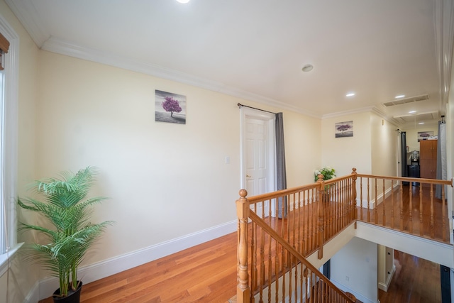 580 Valley Ave, Yonkers, NY 10703 - corridor with an upstairs landing, wood finished floors, ornamental molding, and recessed lighting