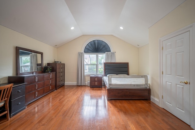 580 Valley Ave, Yonkers, NY 10703 - bedroom featuring multiple windows, light wood finished floors, lofted ceiling, and recessed lighting