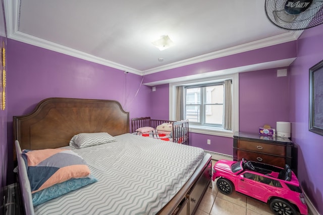 580 Valley Ave, Yonkers, NY 10703 - bedroom featuring crown molding, a baseboard radiator, and light tile patterned floors