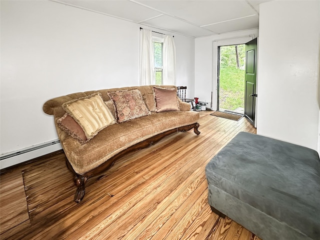 9 Church St, Hyde Park, NY 12538 - living area featuring light wood finished floors and baseboard heating
