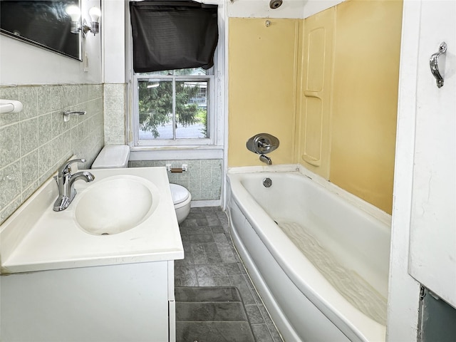 9 Church St, Hyde Park, NY 12538 - full bathroom featuring toilet, vanity, and tile walls