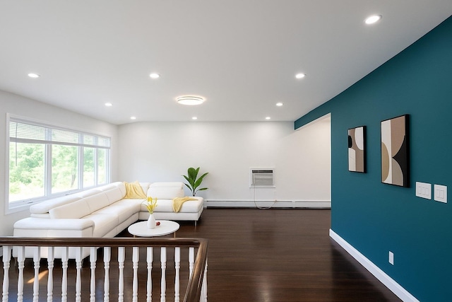18 Park Dr E, Syosset, NY 11791 - living area featuring a baseboard heating unit, recessed lighting, wood finished floors, and baseboards