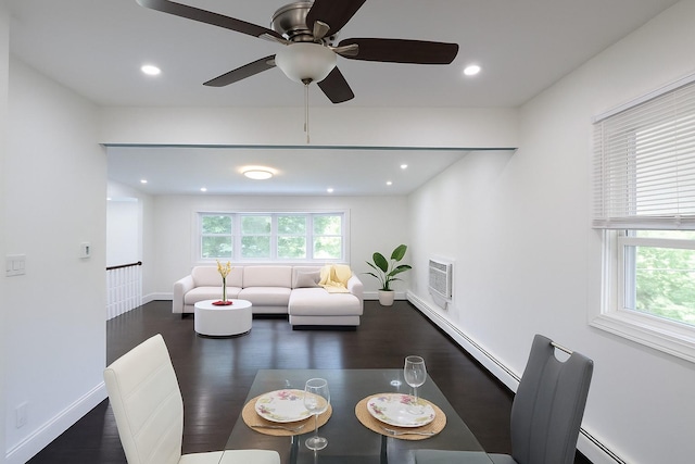 18 Park Dr E, Syosset, NY 11791 - dining room featuring baseboard heating, a baseboard heating unit, ceiling fan, wood finished floors, and baseboards