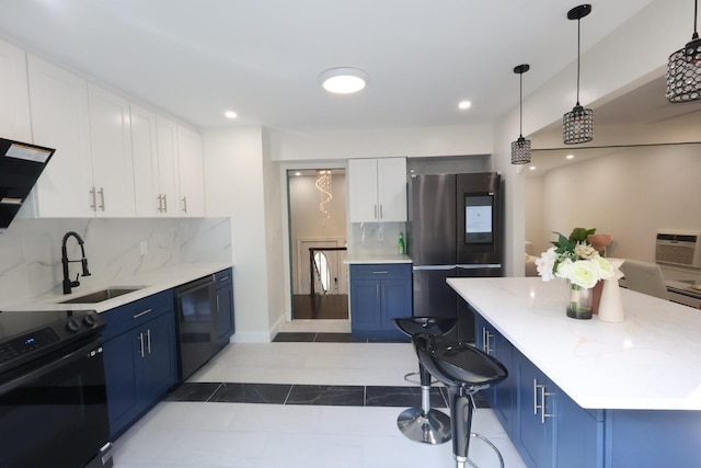 18 Park Dr E, Syosset, NY 11791 - kitchen featuring black appliances, blue cabinets, a sink, tasteful backsplash, and white cabinets
