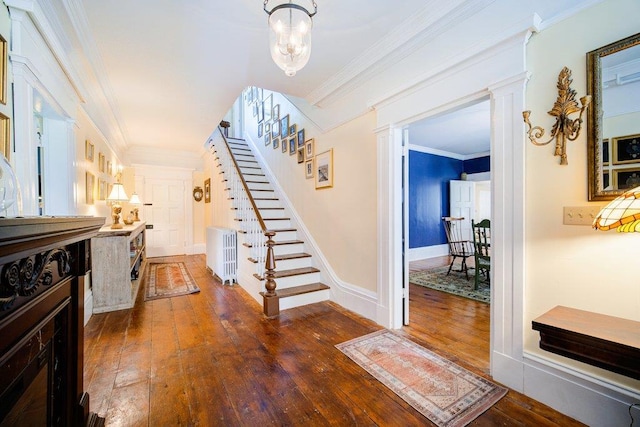 9 Ireland Ave, Wappingers Falls, NY 12590 - foyer entrance featuring stairs, hardwood / wood-style floors, crown molding, and radiator