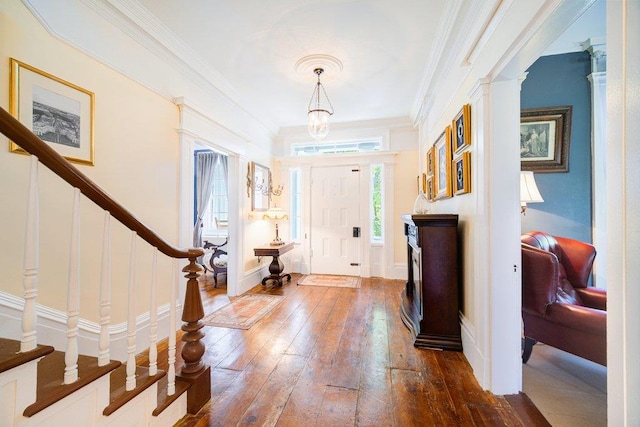 9 Ireland Ave, Wappingers Falls, NY 12590 - entrance foyer with hardwood / wood-style flooring, stairs, and crown molding