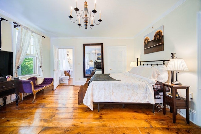9 Ireland Ave, Wappingers Falls, NY 12590 - bedroom featuring a chandelier, wood-type flooring, ornamental molding, and ensuite bathroom