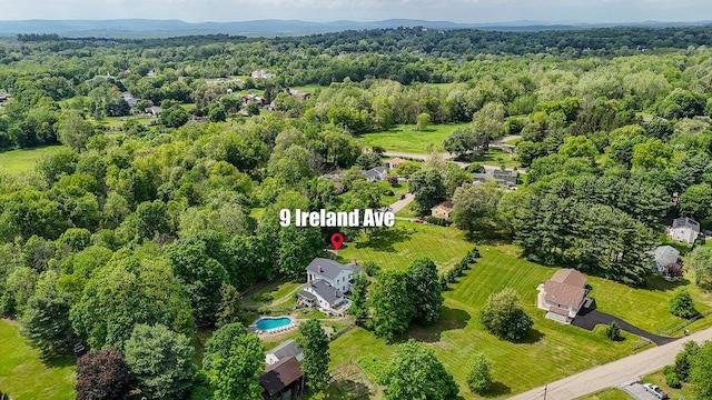 9 Ireland Ave, Wappingers Falls, NY 12590 - aerial overview of property's location with a heavily wooded area