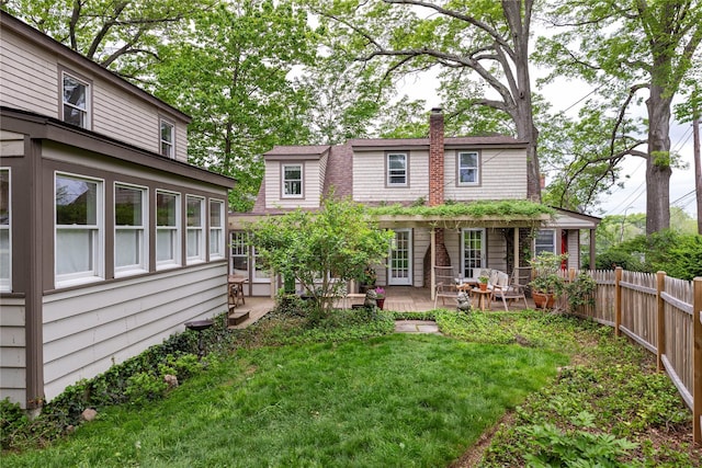 24 Jolliffe Ln, Congers, NY 10920 - rear view of property featuring a chimney