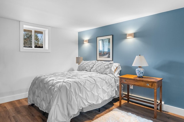 285 County Road 20, Cairo, NY 12413 - bedroom with a baseboard heating unit, wood finished floors, and baseboards