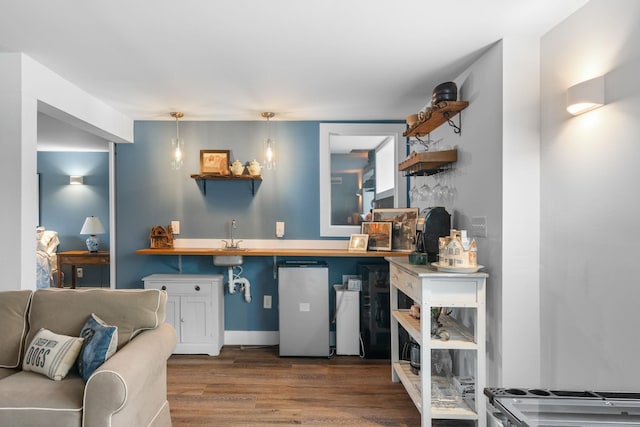 285 County Road 20, Cairo, NY 12413 - kitchen featuring open shelves, wood finished floors, pendant lighting, refrigerator, and a sink