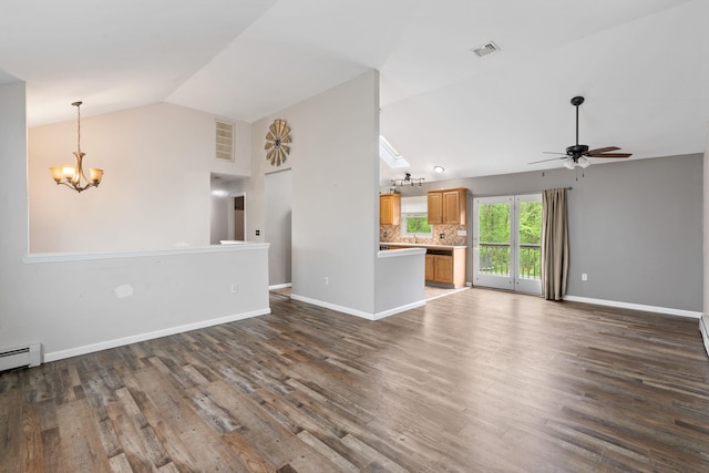 22 Rosio Ln, Modena, NY 12548 - unfurnished living room with lofted ceiling, a ceiling fan, a chandelier, wood finished floors, and baseboards