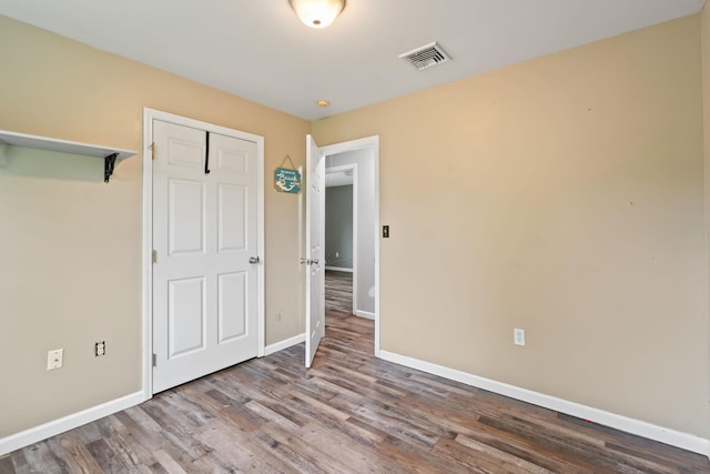 22 Rosio Ln, Modena, NY 12548 - unfurnished bedroom featuring baseboards and wood finished floors