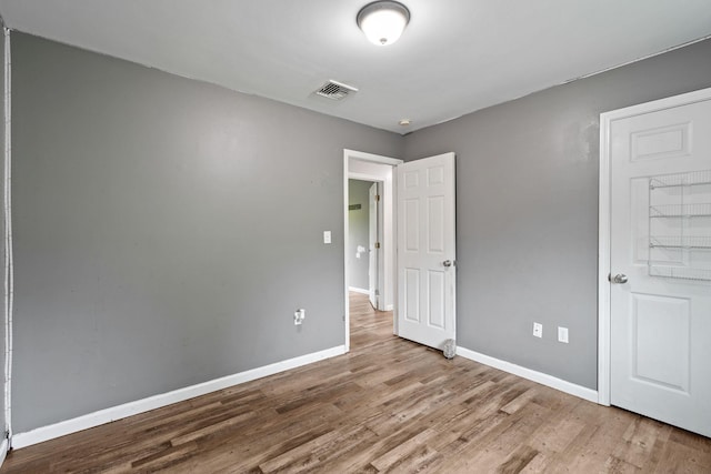 22 Rosio Ln, Modena, NY 12548 - unfurnished bedroom featuring wood finished floors and baseboards