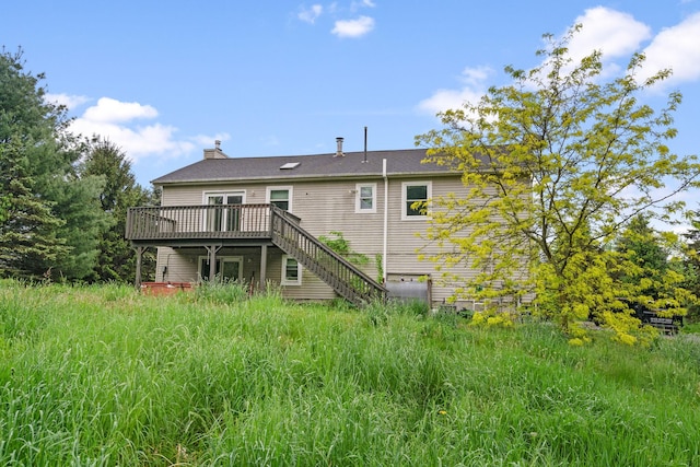 22 Rosio Ln, Modena, NY 12548 - rear view of house featuring a deck, stairs, and a chimney