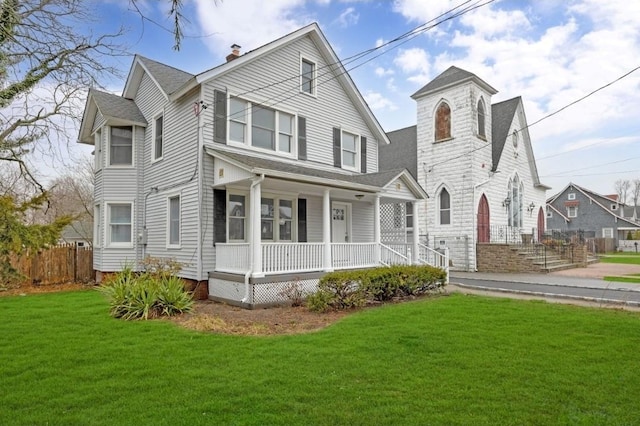 178 N Ocean Ave, Patchogue, NY 11772 - view of front of house with a porch, a chimney, and roof with shingles