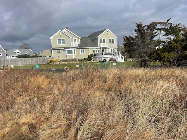 20 S Breeze Dr, Patchogue, NY 11772 - rear view of house with a chimney