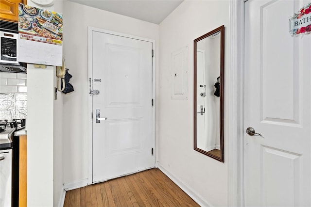 35-38 Junction Blvd Unit 5H, Corona, NY 11368 - doorway with light wood-type flooring and baseboards