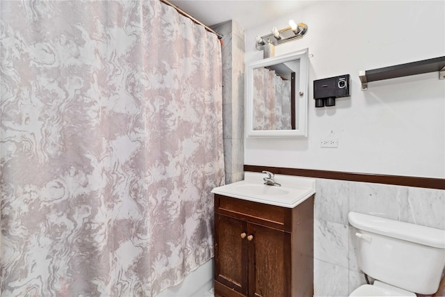 35-38 Junction Blvd Unit 5H, Corona, NY 11368 - full bathroom with toilet, vanity, a shower with shower curtain, and a wainscoted wall