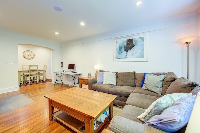 2 Town House Pl Unit 2H, Great Neck, NY 11021 - living area with arched walkways, crown molding, light wood-type flooring, recessed lighting, and baseboards