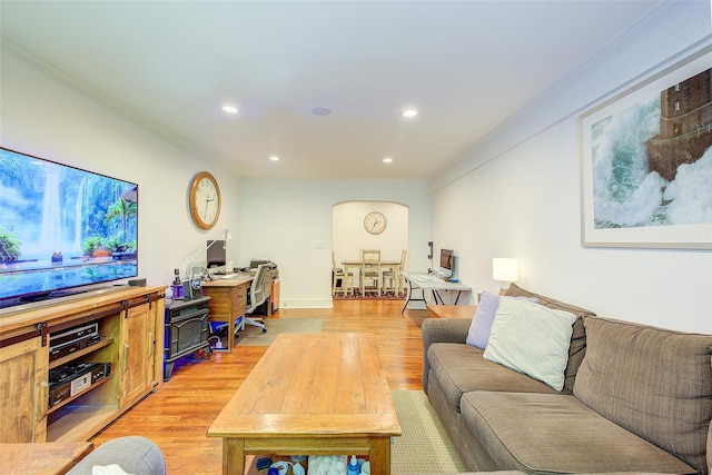 2 Town House Pl Unit 2H, Great Neck, NY 11021 - living room featuring arched walkways, ornamental molding, recessed lighting, light wood finished floors, and an office area