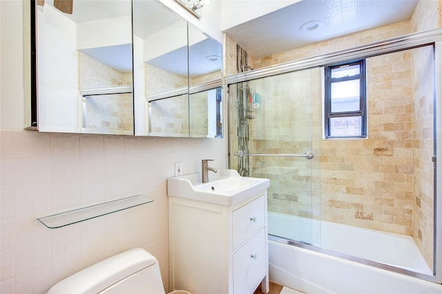 2 Town House Pl Unit 2H, Great Neck, NY 11021 - full bath with toilet, bath / shower combo with glass door, tile walls, and vanity