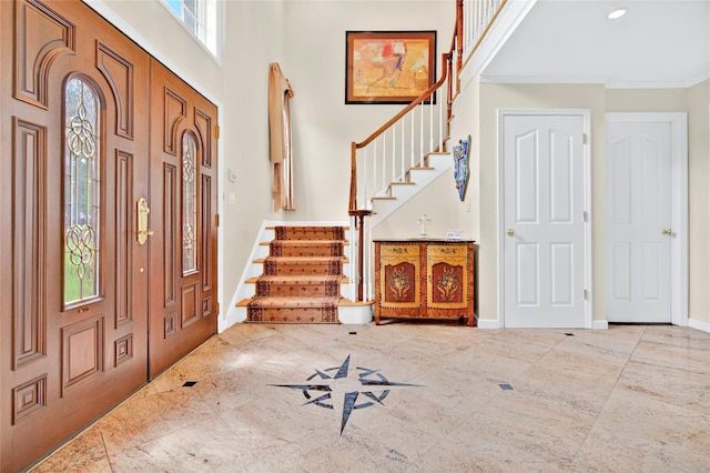 249 Park Ave, Eastchester, NY 10709 - foyer entrance featuring stairs, a high ceiling, baseboards, recessed lighting, and ornamental molding