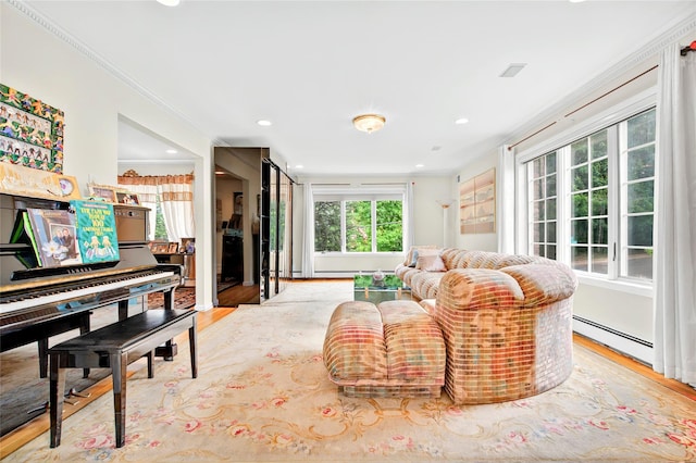 249 Park Ave, Eastchester, NY 10709 - sitting room with a baseboard heating unit, crown molding, wood finished floors, and recessed lighting