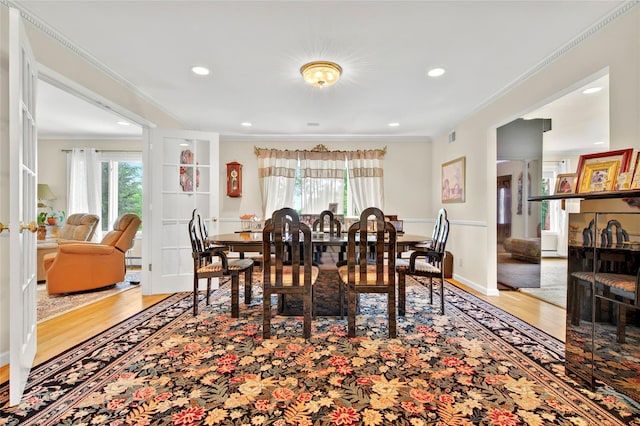 249 Park Ave, Eastchester, NY 10709 - dining room featuring plenty of natural light, crown molding, wood finished floors, recessed lighting, and baseboards