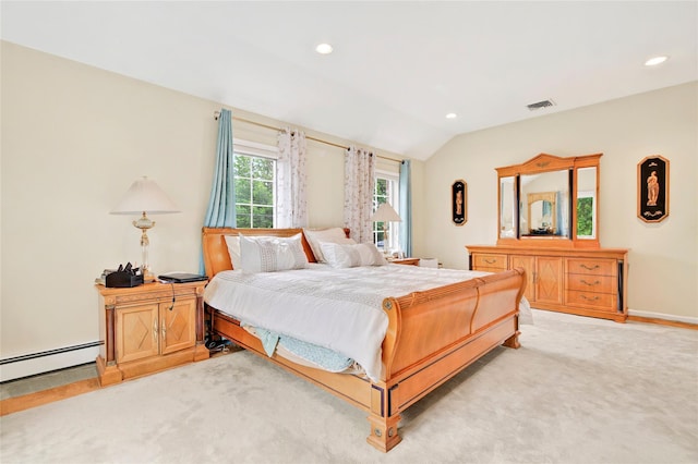 249 Park Ave, Eastchester, NY 10709 - bedroom with light colored carpet, vaulted ceiling, recessed lighting, and a baseboard radiator