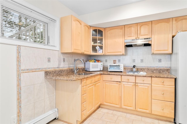 249 Park Ave, Eastchester, NY 10709 - kitchen featuring light brown cabinets, white appliances, a sink, under cabinet range hood, and light stone countertops