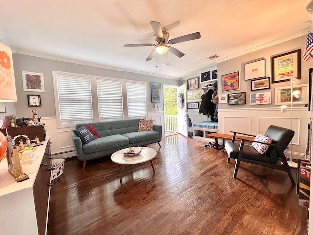 165 Smith Ave, Holbrook, NY 11741 - living room featuring ornamental molding, ceiling fan, dark wood-style floors, a decorative wall, and baseboard heating