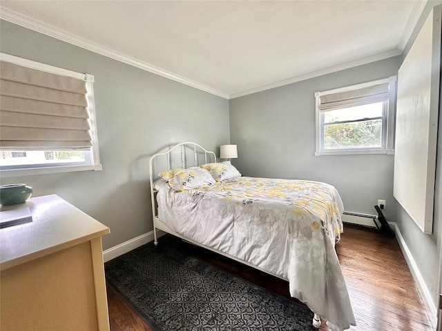 165 Smith Ave, Holbrook, NY 11741 - bedroom featuring multiple windows, wood finished floors, ornamental molding, a baseboard heating unit, and baseboards