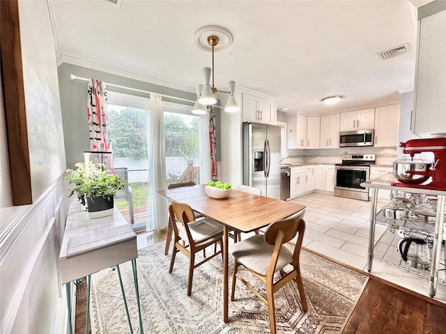 165 Smith Ave, Holbrook, NY 11741 - dining area with crown molding