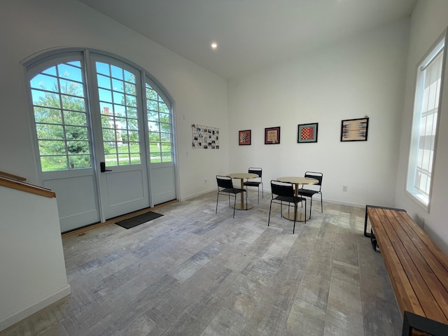 dining room with recessed lighting and baseboards