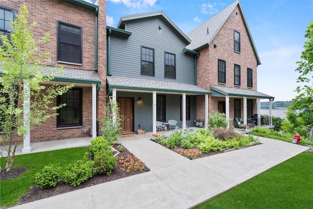 17 River Ridge Court, Beacon, NY 12508 - multi unit property with covered porch, brick siding, and a front yard