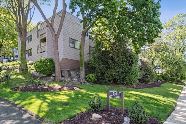 216 Purchase St Unit A, Rye, NY 10580 - view of home's exterior featuring a yard