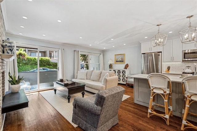 216 Purchase St Unit A, Rye, NY 10580 - living area with crown molding, dark wood finished floors, a chandelier, and recessed lighting