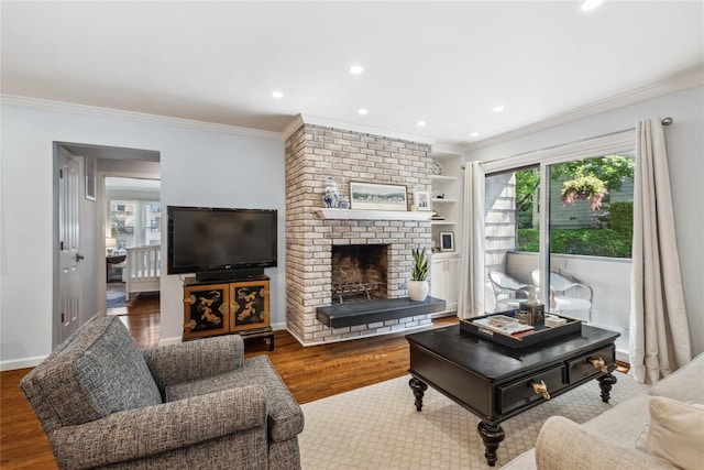 216 Purchase St Unit A, Rye, NY 10580 - living room with crown molding, plenty of natural light, wood finished floors, a brick fireplace, and recessed lighting