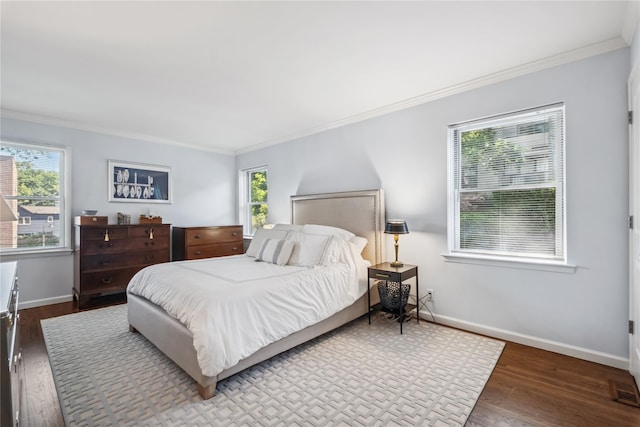216 Purchase St Unit A, Rye, NY 10580 - bedroom with multiple windows, crown molding, wood finished floors, and baseboards