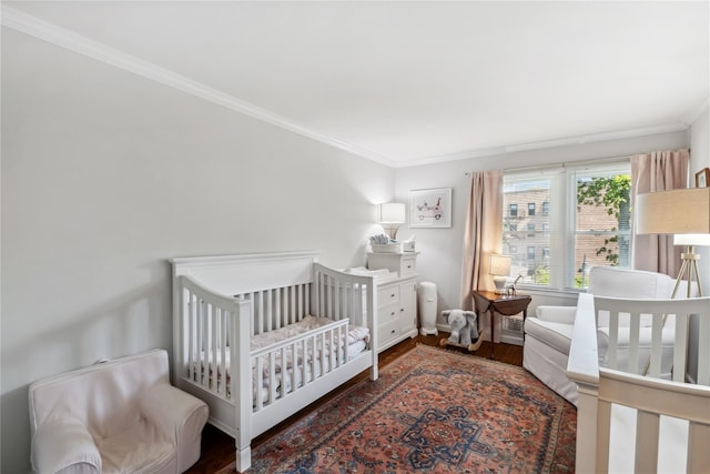 216 Purchase St Unit A, Rye, NY 10580 - bedroom with ornamental molding, baseboards, and wood finished floors