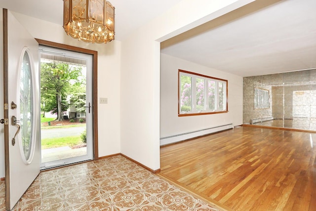 19 Verona Ct, New City, NY 10956 - entryway with a baseboard radiator, a chandelier, baseboards, and wood finished floors