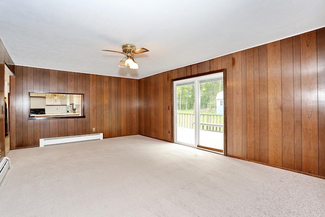 19 Verona Ct, New City, NY 10956 - unfurnished living room featuring a baseboard heating unit, a ceiling fan, light carpet, wood walls, and baseboard heating