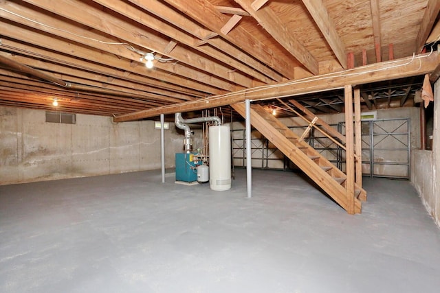 19 Verona Ct, New City, NY 10956 - unfinished below grade area featuring water heater, stairway, and a heating unit
