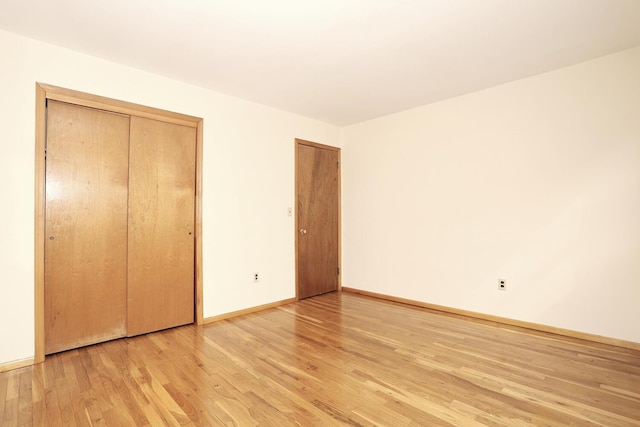 19 Verona Ct, New City, NY 10956 - unfurnished bedroom with light wood-type flooring, multiple closets, and baseboards