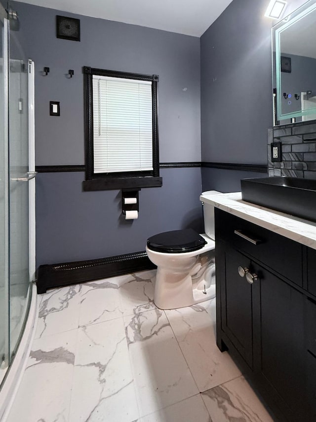 284 Titusville Rd, Poughkeepsie, NY 12603 - bathroom featuring marble finish floors, a shower stall, vanity, and toilet